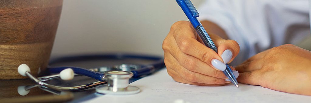 woman holding a pen thinking about what is a cause of action