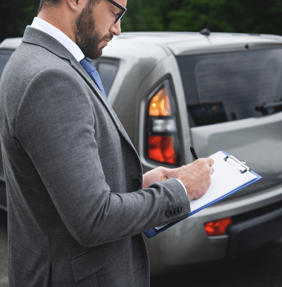 Car accident lawyer in Kansas City assessing a car accident