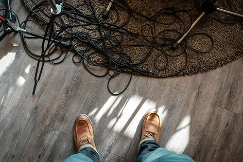 person looking at wires on ground wonders if is slip and fall a personal injury